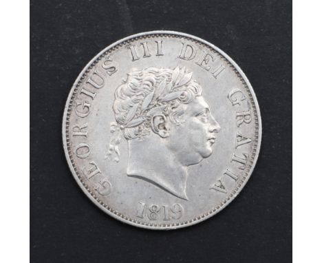 A George III Halfcrown, small laureate head r. dated 1819, reverse with crowned garter and shield. *CR Light surface marks, a