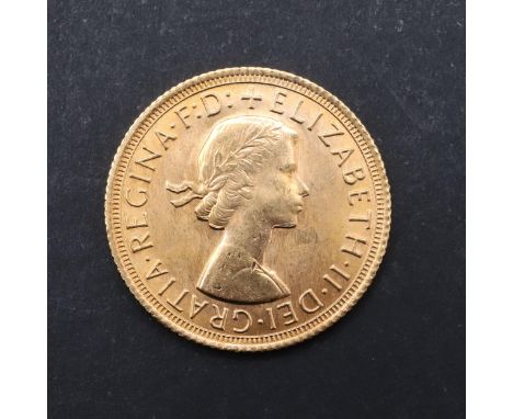 An Elizabeth II Sovereign, bare head bust r. reverse St. George and the Dragon, dated 1968. *CR Good condition, very light su