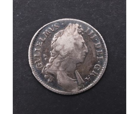 A William III Shilling, first draped bust r. Reverse with crowned cruciform shields, dated 1696. *CR A nice example with ligh