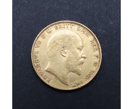 An Edward VII Sovereign, bare head r. Reverse with St George and the Dragon, dated 1904. *CR With some rubbing and light wear