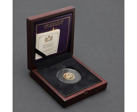 A Queen Elizabeth II's 90th gold proof penny. Crowned bust r. reverse 90 and one penny beneath a crown. In capsule and presen