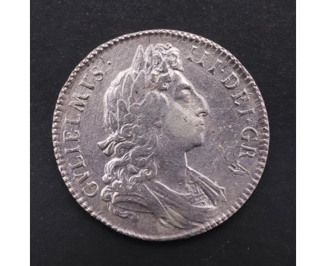 A William III Halfcrown, first laureate and draped bust r. Reverse with crowned cruciform small shields and vacant angles. Da