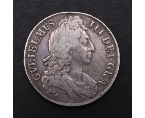 A William III Crown, third draped bust, r. reverse with cruciform shields dated 1696, rim Octavo. *CR Slight rubbing to both 