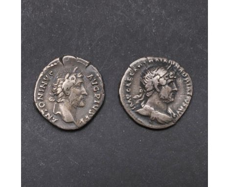 A silver denarius of Hadrian, laureate and draped bust r. Legend 'IMP CAESAR TRAIAN HADRIANUS AUG', Reverse P M TR P COS III.