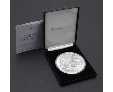 A Jubilee Mint Elizabeth II crowned bust r. 10 pound coin, Reverse Royal coat of arms '10 oz Fine silver 999', 2021. uncircul