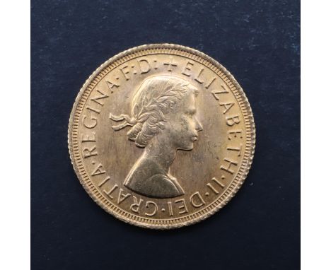 An Elizabeth II Sovereign, bare head bust r. reverse St. George and the Dragon, dated 1968. *CR Good condition, very light su