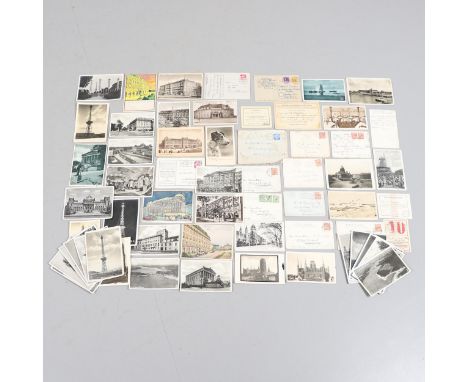 A collection of postcards including about 25 of views of Berlin including views of the Chancellery, Adolf Hitler Platz, Brand