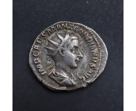 Silver Antoninianus, Radiate portrait r. Legend IMP CAES M ANT GORDIANUS AUG. Reverse Standing figure of Virtus standing rest