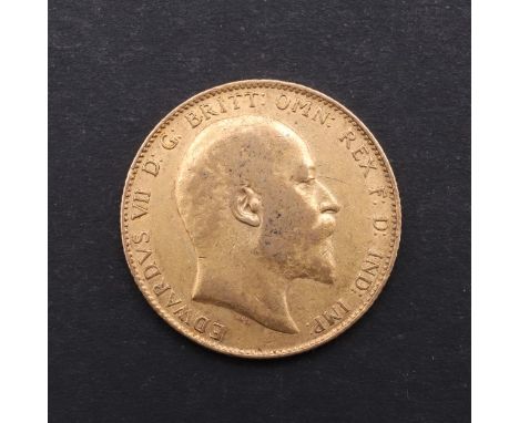 An Edward VII Sovereign, bare head bust r. reverse St George and the Dragon. Dated 1906. *CR Marking and rubbing to both side