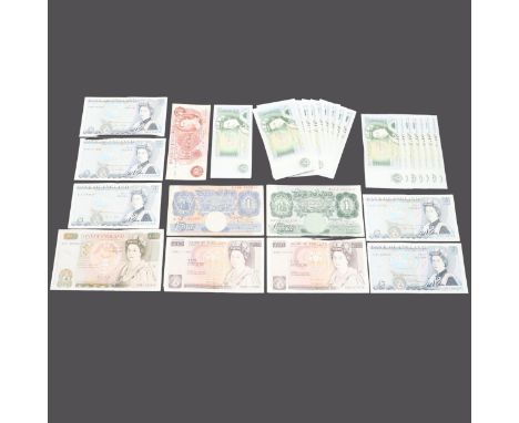 A collection of banknotes comprising a Series 'D' pictorial issue £50 note D43 392344 signed by G.M. Gill. Two similar issue 