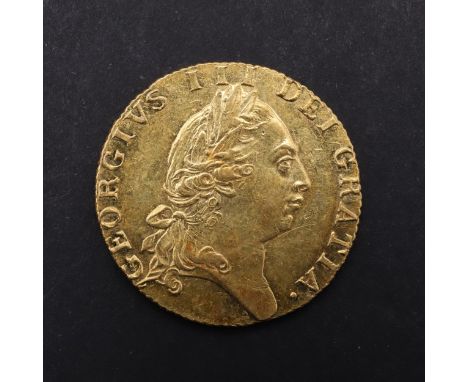 A George III Guinea, fifth laureate and draped bust r. Reverse with 'Spade' shaped shield and date 1789. *CR A superb example