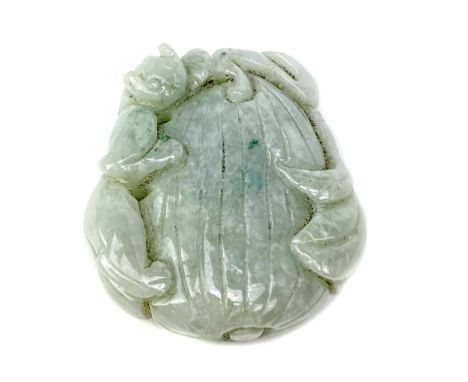 20TH CENTURY JADE PENDANT, carved with animal forms, around a fruit, 5.6cm high
