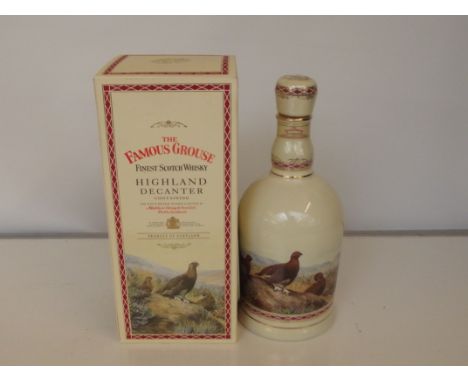 Bottle of Famous Grouse sealed and unopened 70cl decanter by Wade 