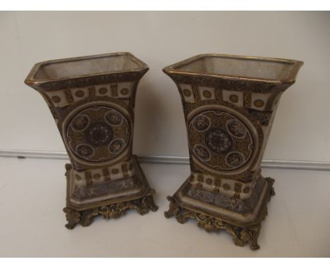 Pair of brass and ceramic Oriental vases