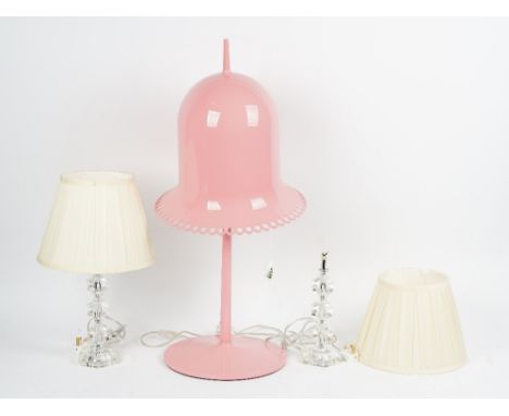 A Lolita pink table lamp, with a pivoting shade, and a pair of hexagonal table lamps, with cream silk shades (3), pink lamp; 