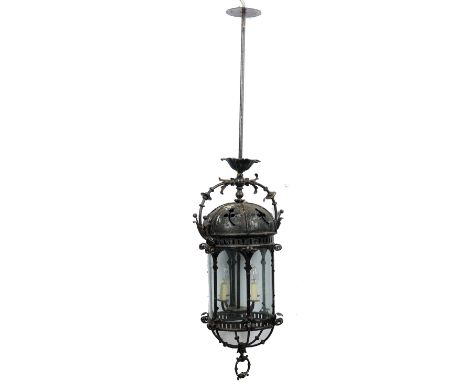 A cast iron four-light storm lantern.