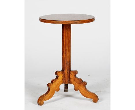 A stained pine pedestal table, 19th century, with a circular top, on a pillar and tripod base, 37cm wide x 57cm high.