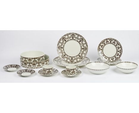 A Limoges J L Coquet tea and dinner service, and with various serving dishes (qty).