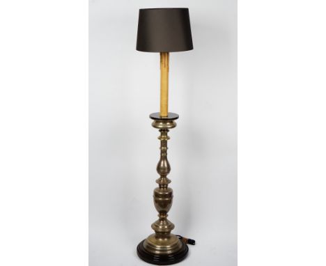 A silvered metal and wooden floor standing lamp, in 17th century Italian style, with grey silk shade.139cm tall without shade