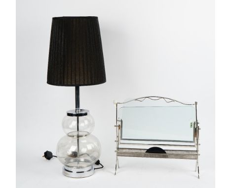 A chromium frame magazine rack with plate glass sides, and a glass chromium mounted double gourd table lamp, with pleated bla