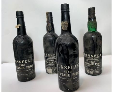 A bottle of Fonseca Guimaraens 1968 vintage port, a bottle of Fonseca Guimaraens 1972 vintage port and two bottles of Fonseca
