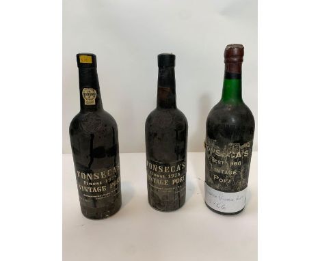 Two bottles of Fonaseca's 1975 vintage port and a bottle of Fonseca's 1966 vintage port, with a later applied handwritten pap
