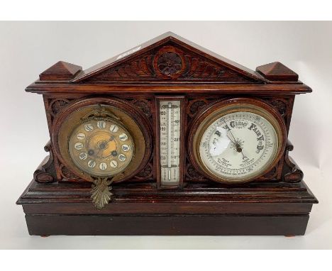 A 20th century oak clock, barometer and thermometer weather station 