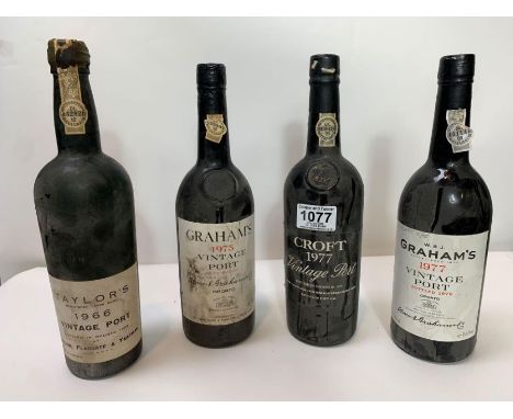 A bottle of Croft 1977 vintage port, a bottle of Graham's 1975 vintage port, a bottle of Graham's 1977 vintage port and a bot