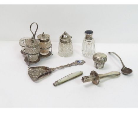 A small silver cruet frame with a glass salt, and two silver mounted glass pots for mustard and pepper; an Edwardian silver s