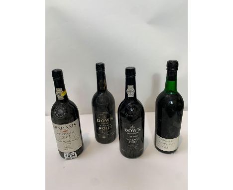 A bottle of Dow's 1980 vintage port, a bottle of Dow's 1983 vintage port, a bottle of Graham's 1985 vintage port and a bottle