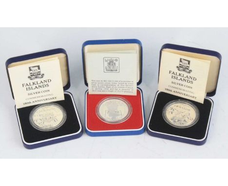 Falkland Islands, Royal Mint, 1983 silver 150th Anniversary fifty pence coin, together with one other example and a 1977 silv