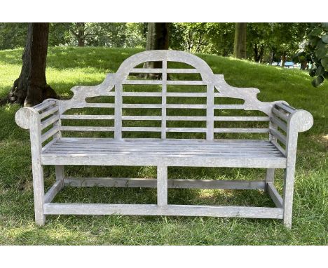 LUTYENS STYLE GARDEN BENCH, well weathered slatted teak after the design by Sir Edwin Lutyens, 165cm W. 