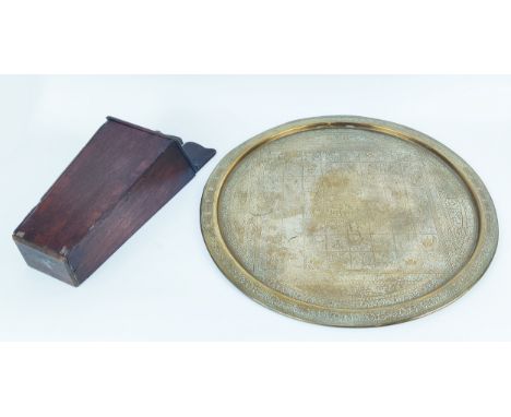 A GEORGE III OAK AND MAHOGANY WALL MOUNTING CANDLEBOX, 45cm H and A LARGE CIRCULAR BRASS CHESS TRAY, 61cm Diameter. (2) 