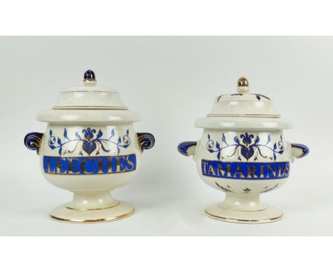 TWO APOTHECARY CREAM CERAMIC JARS, entitled 'Tamarinds', and 'Leeches', pedestal form, each 32cm H. (2) 