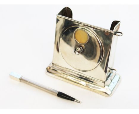 A hallmarked silver card holder and matched pen marked "Sterling Silver"