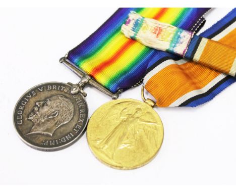 A WWI medal pair inscribed 38738 PTE. A. SUGDEN. E. LAN. R.