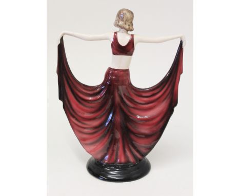 Josef Lorenzl for Goldscheider. A stylish dancing girl pottery figure. H29cm. Condition - head has been broken off and repair