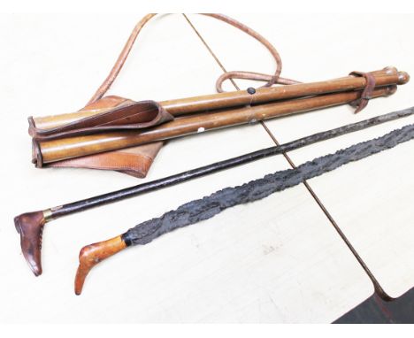 A folding stool, a walking stick with "boot" handle and another