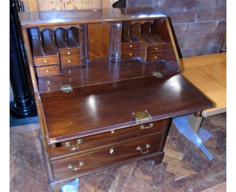 George III style mahogany bureau with fitted interior on bracket feet 75cm wide We do not supply condition reports for our In