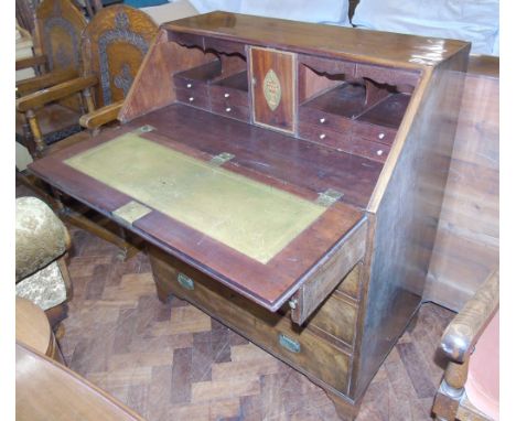George III mahogany and crossbanded bureau, with four graduated drawers, bracket feet and fitted interior, 92cm wide, 108cm h