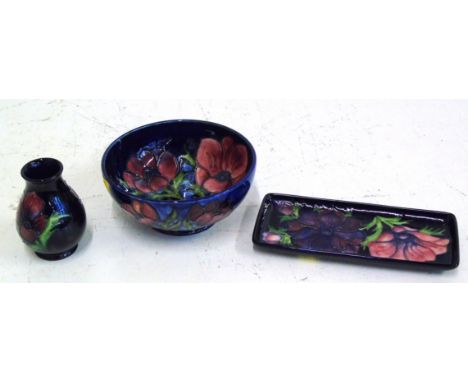 Moorcroft Anemone vase 10cm high, a bowl and pen tray, all with silver line marks. We do not supply condition reports for our