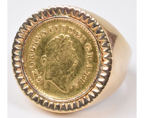 A George III, Third-Guinea, 1797, First laureate head r. R. Crown, date in legend, gold, F, set in a 9ct gold ring mount, hal