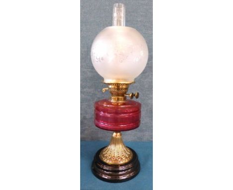 Victorian cranberry and brass oil lamp We do not supply condition reports for our Interiors Sale