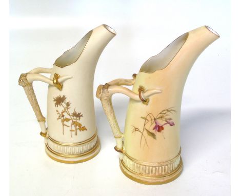 Two Royal Worcester ivory ground jugs We do not supply condition reports for our Interiors Sale