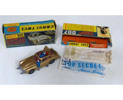 Corgi toys boxed Aston Martin D.B.S complete with instructions and spare bandit and Lamborghini Marzal (189) We do not supply