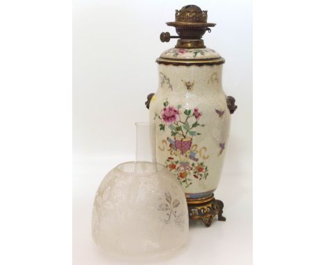 Early 20th century oil lamp with Chinese ceramic vase base. We do not supply condition reports for our Interiors Sale