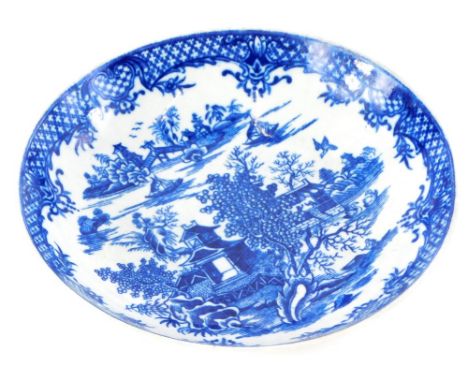 An 18thC Worcester porcelain saucer dish, printed in blue with oriental scenes of buildings, boats, etc., crescent mark to un