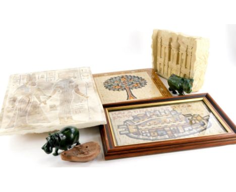 A collection of souvenir items, to include a carved stone building, two African heart stone models of a hippo and a rhino, a 