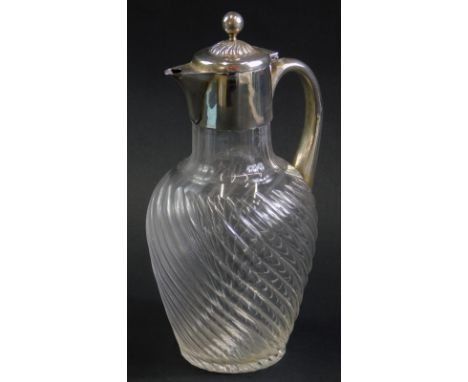 A Victorian silver and cut glass claret jug, indistinctly hallmarked, possibly Birmingham 1890, 26cm high.