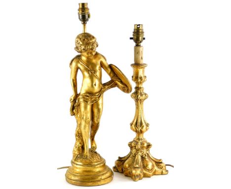 A gilt plaster table lamp base, decorated in the form of a young cherub holding a shield with quiver attached, 50cm high, and